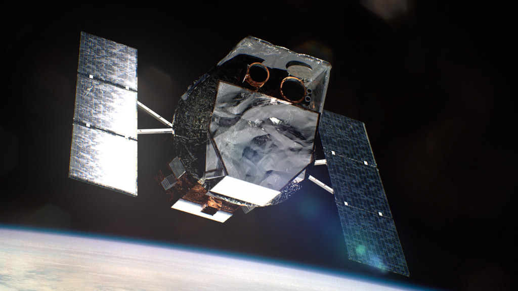 The Neil Gehrels Swift Observatory in orbit above Earth